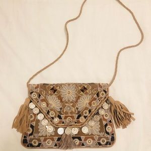 Ibban tan purse with patterns, coins and tassels
